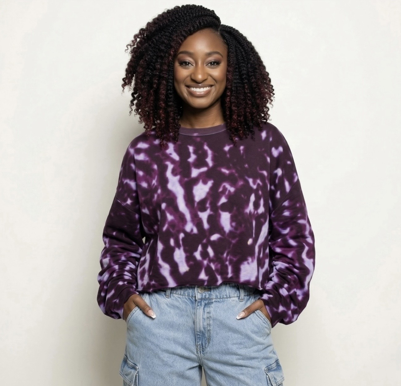 Portrait in a patterned purple top