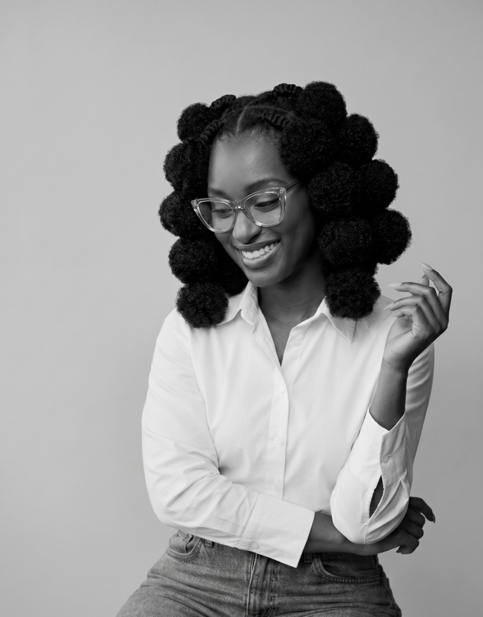 Black-and-white portrait in a white blouse